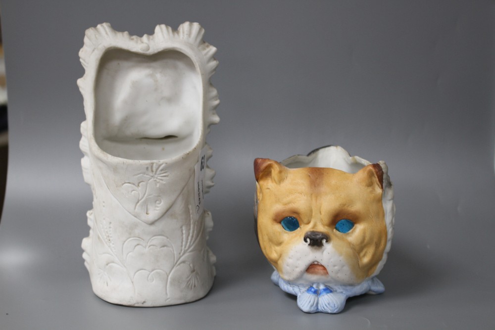 Two 19th century German coloured bisque novelty ornaments, one a night light modelled with cats, dog and owls faces, with coloured glas